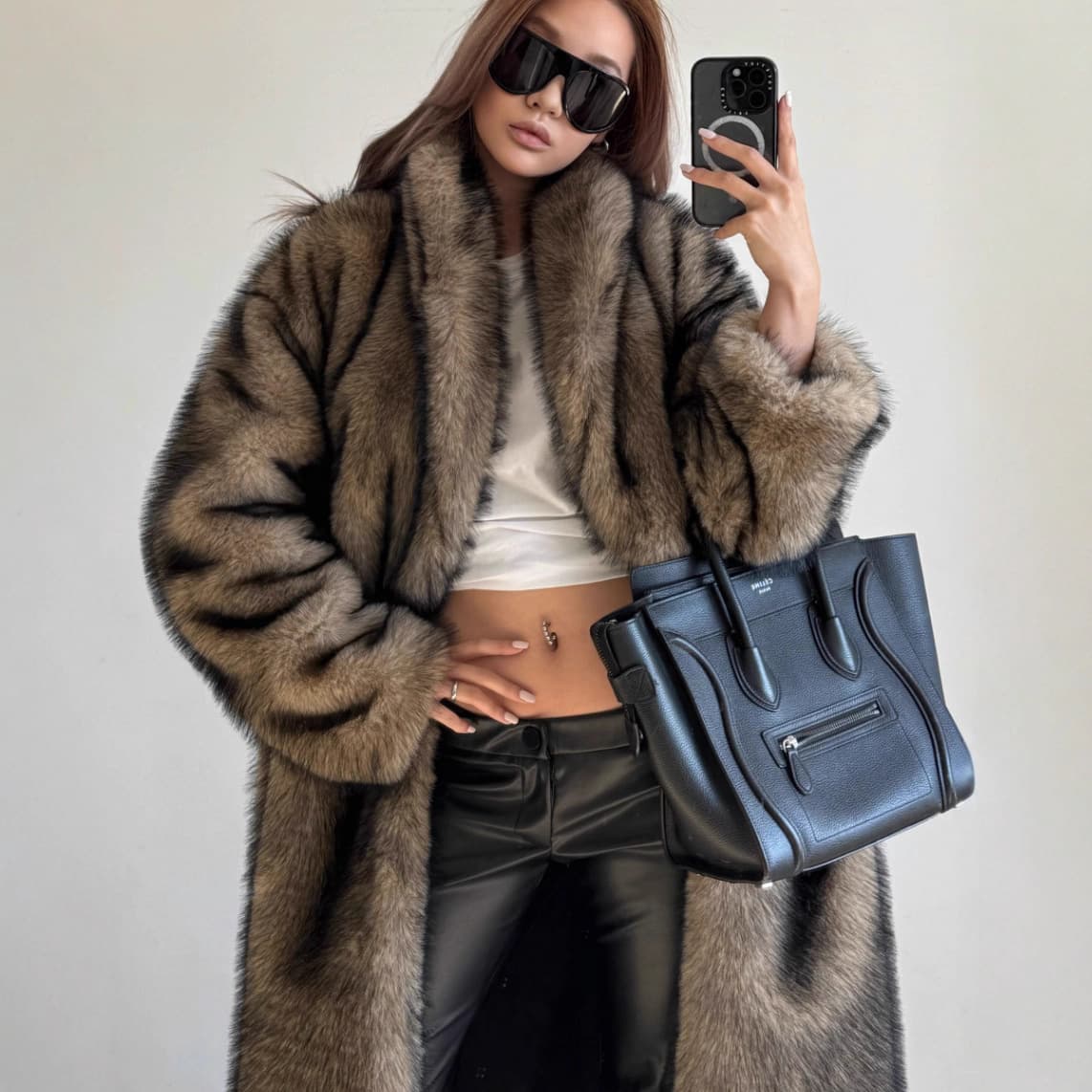 New European and American style faux fur coat, extra long, with a shawl collar, fashionable fox fur tuft.