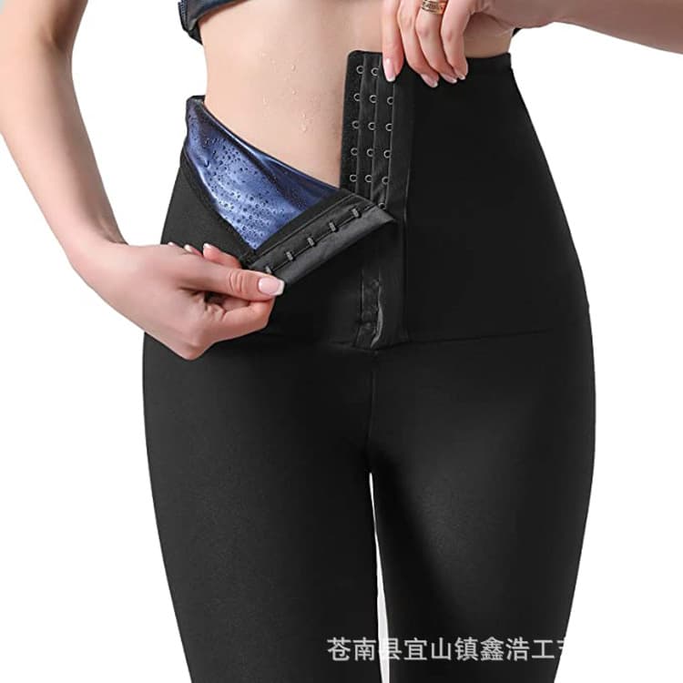High-waisted, sweat-inducing sauna shorts for trainers, shaping their lower body with high-waisted, sweat-inducing tights.