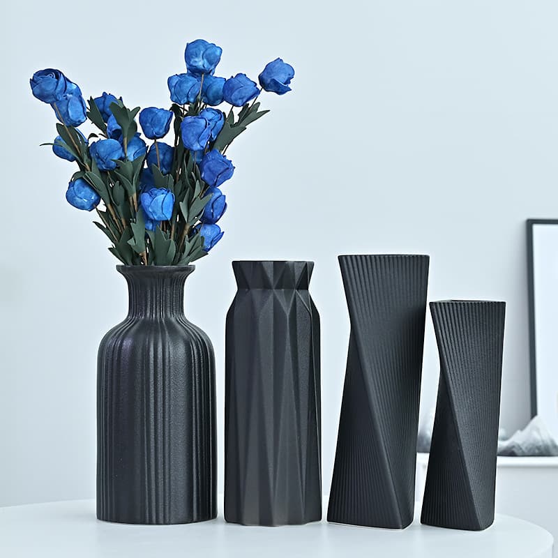 Modern minimalist black ceramic vase for living room, home, flower arrangement, dried flower decoration, hotel, guesthouse, and ornamental items.