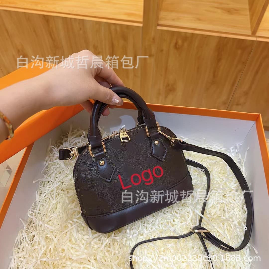 Cross-border trade new batch of Donkey brand light luxury handbag, fashionable and versatile single-shoulder crossbody, niche retro half-round shell bag