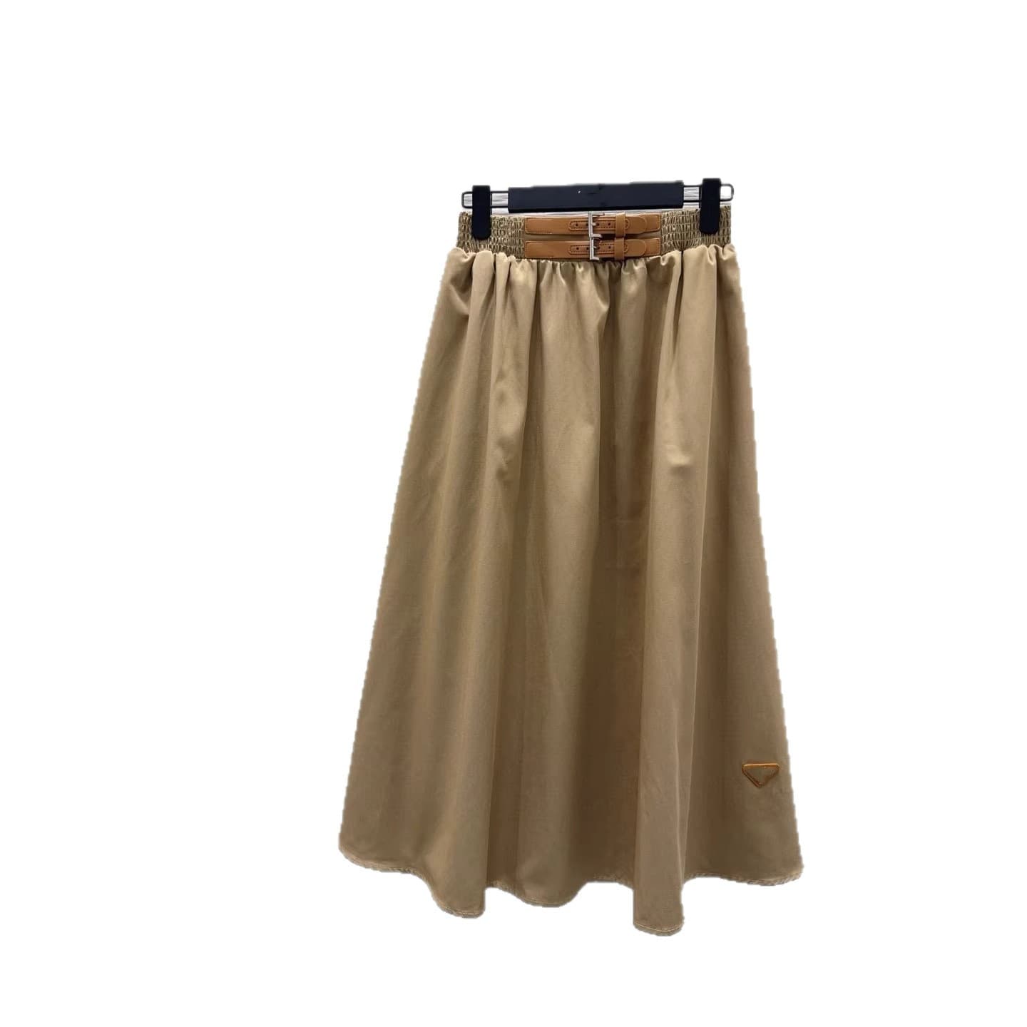 Shenzhen Nanyou 2026 Spring Korean Retro High-Waisted A-Line Midi Skirt for Women, Slimming, Hip-Concealing, Versatile, and Elegant.