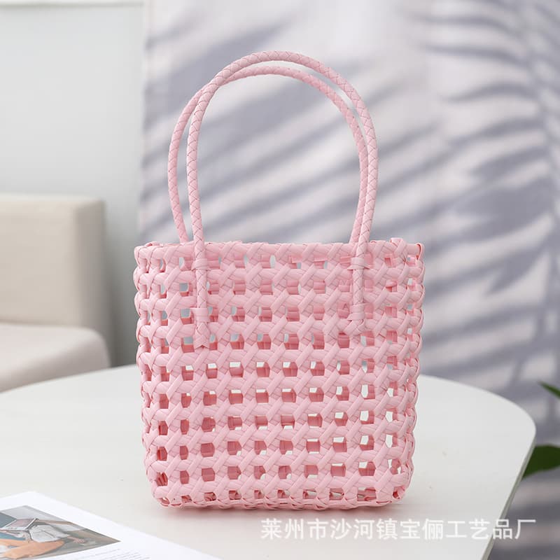 New summer hollowed-out tote bag, sweet and fresh candy-colored tote bag, French-style niche woven plastic bag.