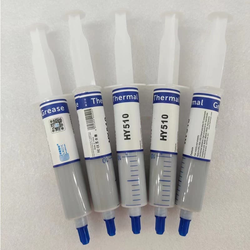 Large syringe-type gray silver-containing thermal paste for CPUs and graphics cards.