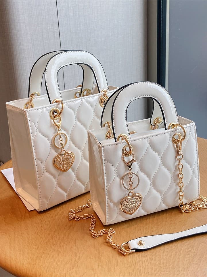 This stylish and sophisticated patent leather Lady Dior bag is a trendy and versatile crossbody bag, a popular choice among online influencers and niche brands.