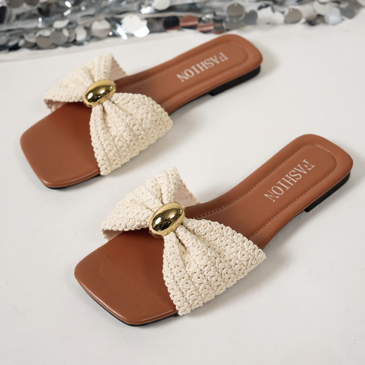 Retro woven bow flat slippers for women, new summer 2026 style, fashionable beaded embellished resort slippers.