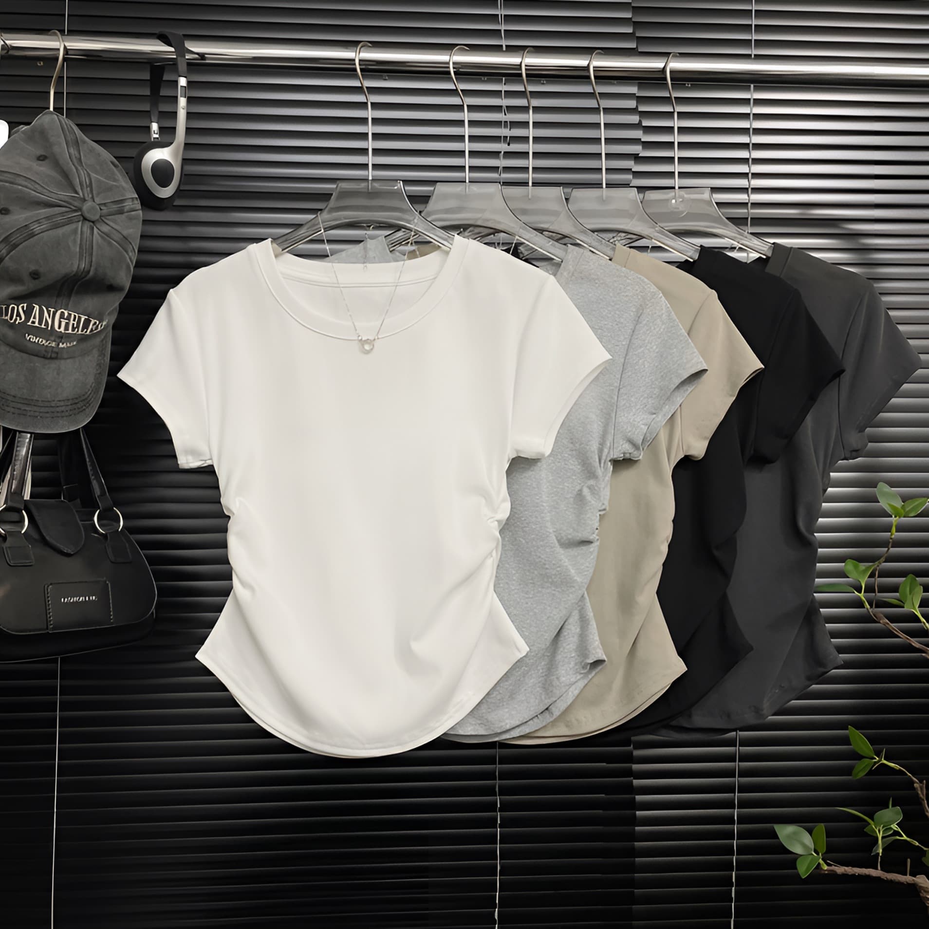 Summer round neck V-neck design, pleated waist, versatile and slimming short-sleeved off-shoulder T-shirt for women, sexy and fitted, irregular shape.