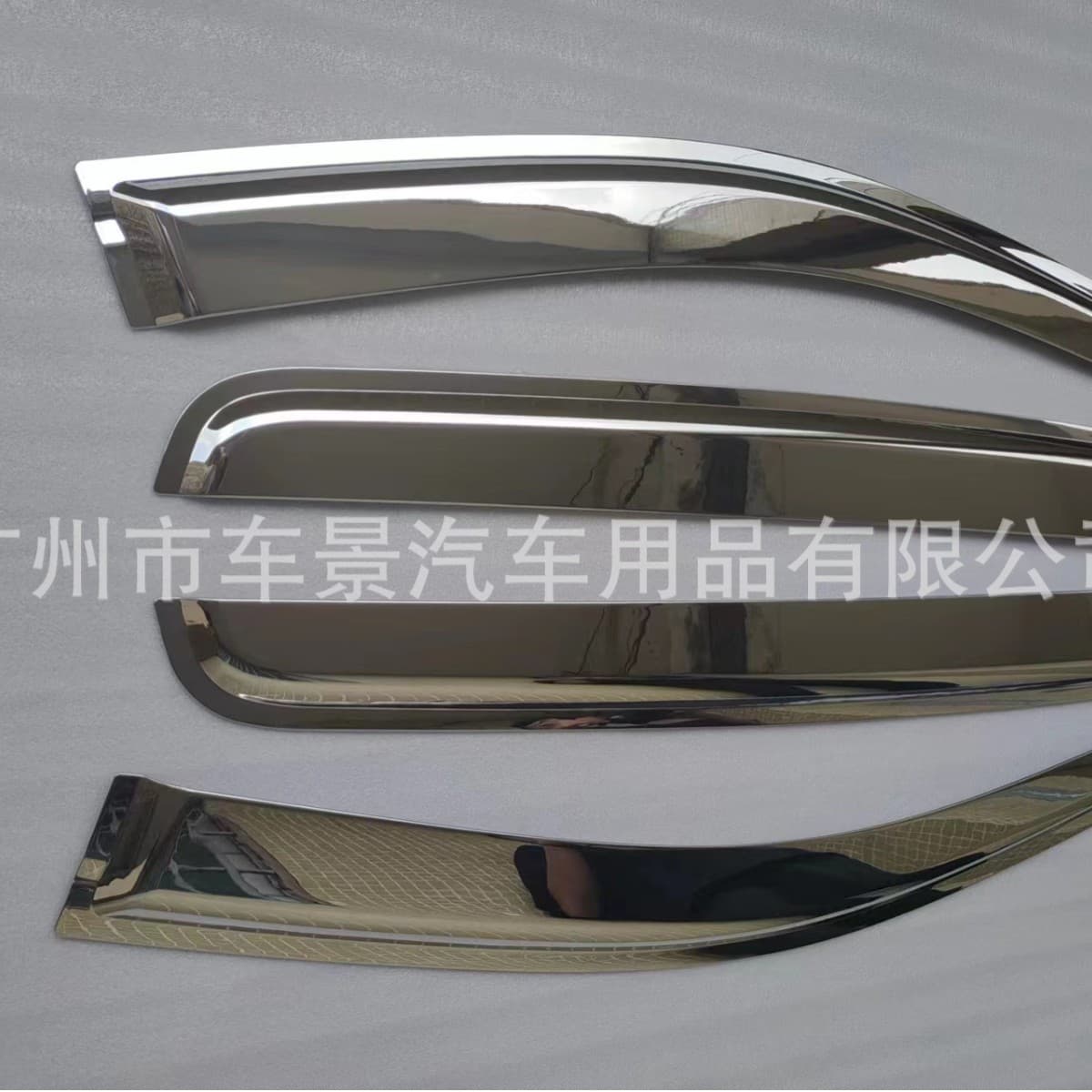 Electroplated rain guards for 2015 Ford Ranger windows and doors.
