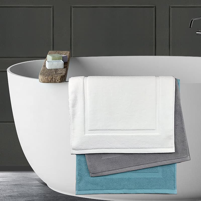 Wholesale hotel white jacquard cotton bath towels, thickened SPA bathroom foot mats with optional logo embroidery