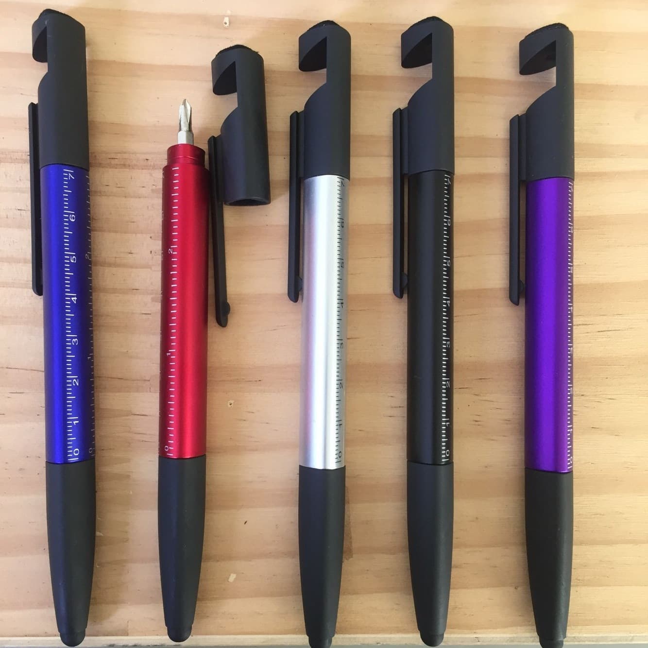 Manufacturer produces customized mobile phone holder, touch screen ballpoint pen with screwdriver, scale and ruler, capacitive pen, portable screws