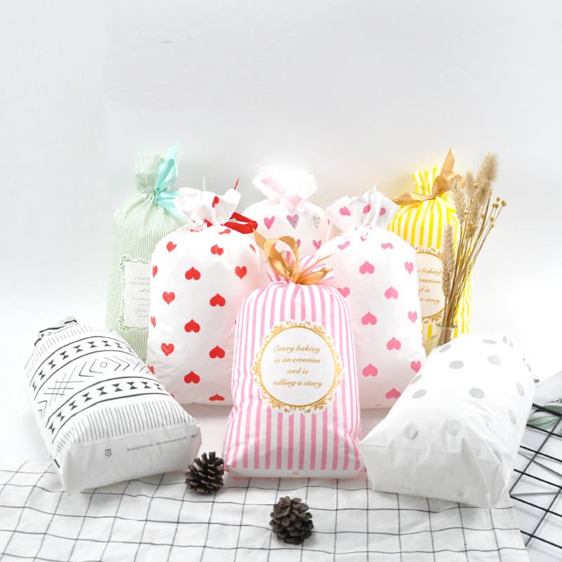 Cross-border hot-selling ribbon drawstring bag Christmas and New Year packaging gift bag candy paper bag biscuit bundle pocket 50 pieces