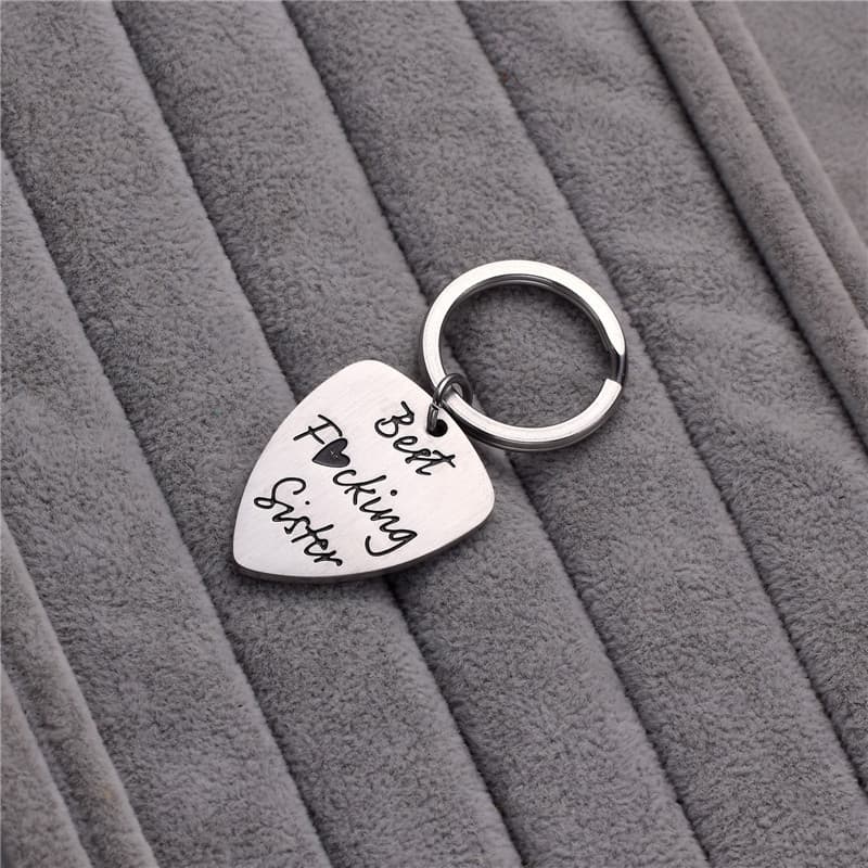 Cross-border hot-selling creative engraved best fucking sister titanium steel guitar pick keychain wholesale