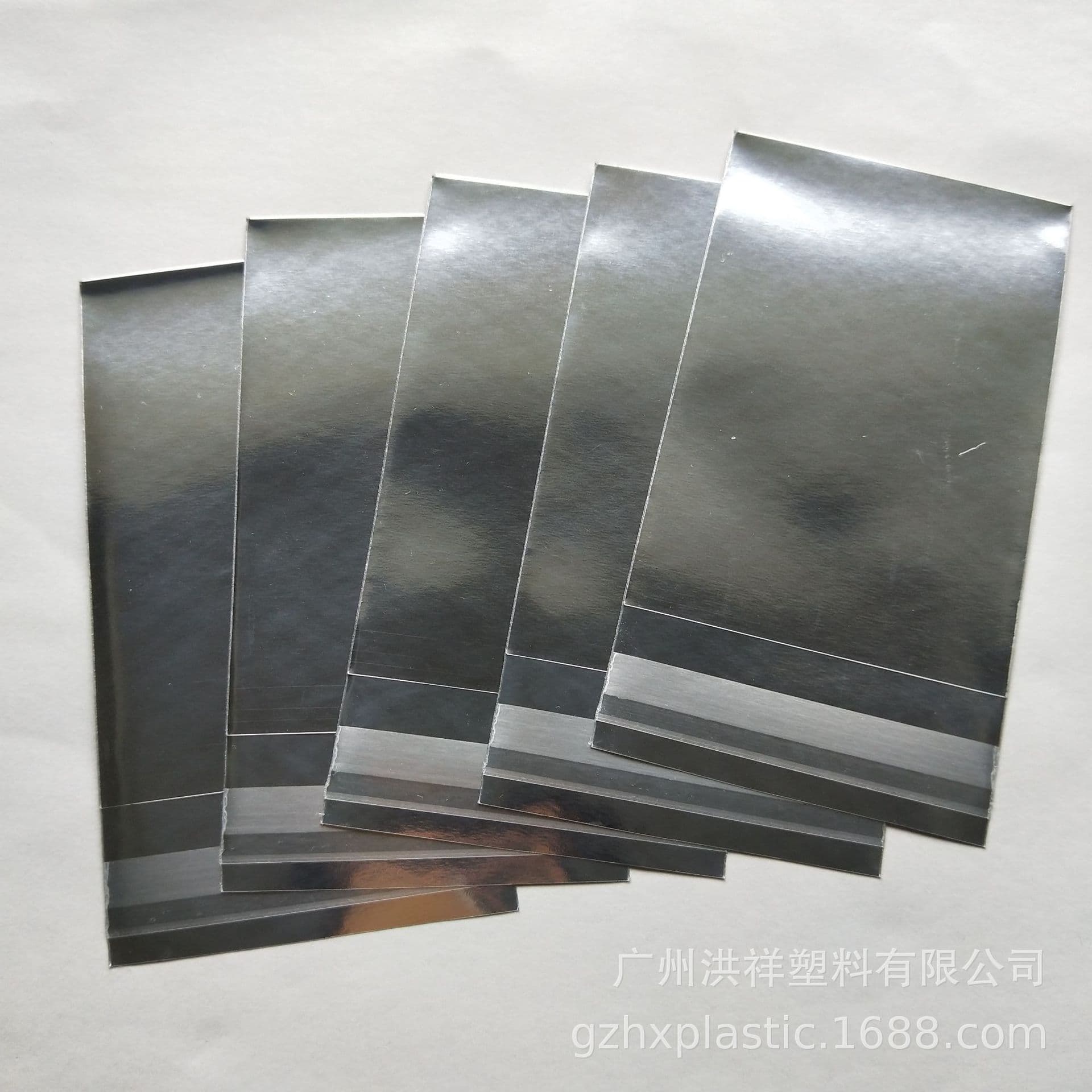 Factory direct sales two-sided aluminum self-adhesive bags, high-end jewelry aluminum film bags, acrylic stand sign foil packaging