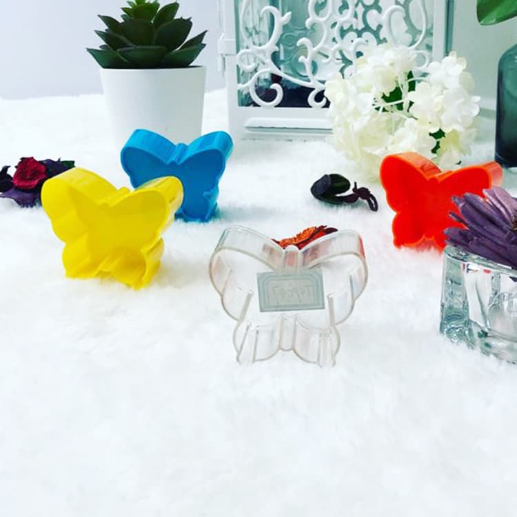 Manufacturer wholesale TSPC47 flame retardant highly transparent plastic tealight shell butterfly shaped tealight stand candle cup