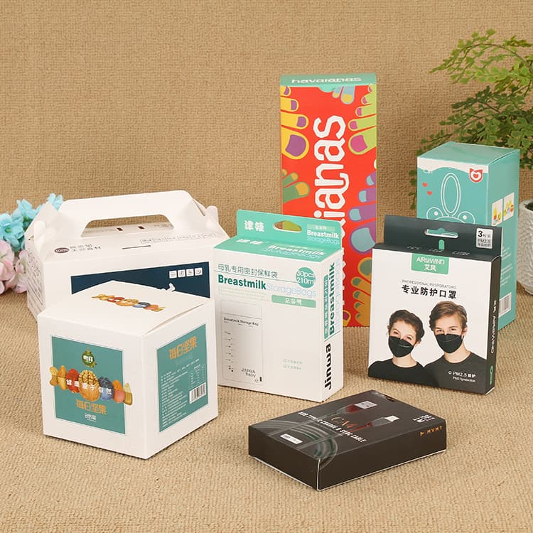 Custom color boxes for cakes, medicine, cosmetics, gifts, masks, tea, and wine, made from white cardboard.