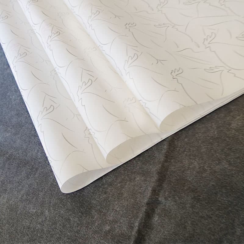 Custom printing of logos and patterns on translucent paper, including clothing packaging linings, Bible paper, and copy paper.