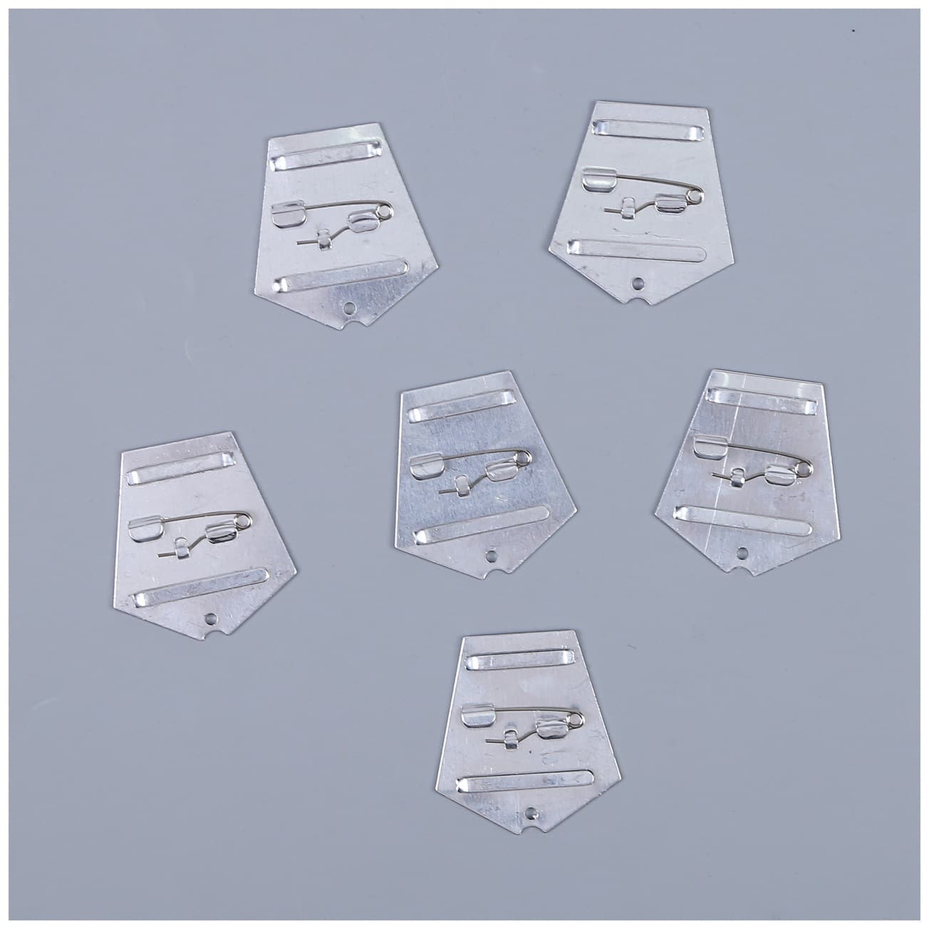 Badges, medals, ribbons, medal plates, aluminum sheets – custom manufacturing available.