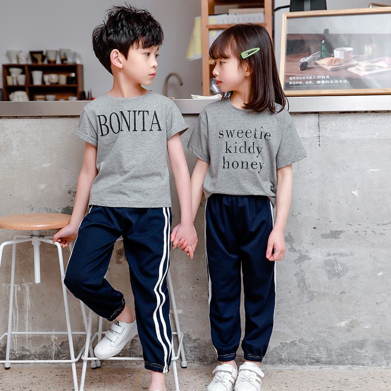 New children's loose solid color sports pants summer baby casual pants for boys and girls solid color side striped anti-mosquito pants