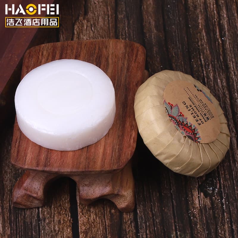 Disposable toiletries in hotel rooms: small round soaps