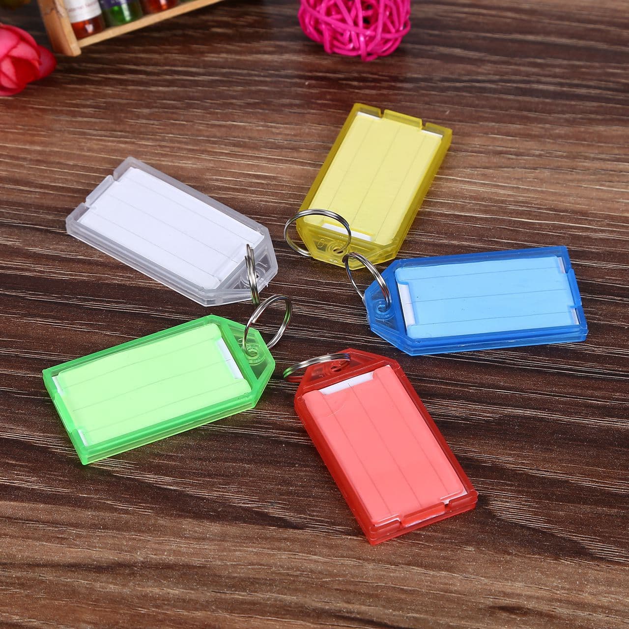 Wholesale available colored transparent flip-top key tags, markers, luggage tags, labels, creative classification tags, and keychains.