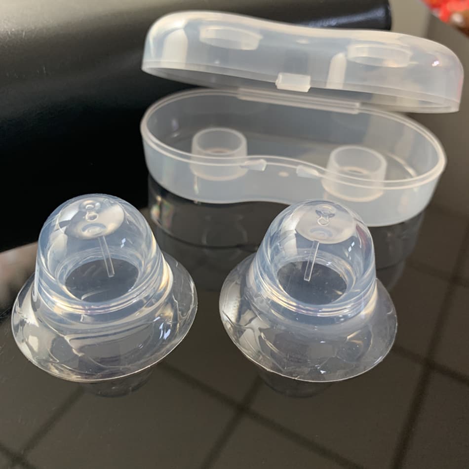 Wholesale of all-silicone nipple suction devices, breastfeeding flat nipple protectors, and nipple correctors for mothers and babies.