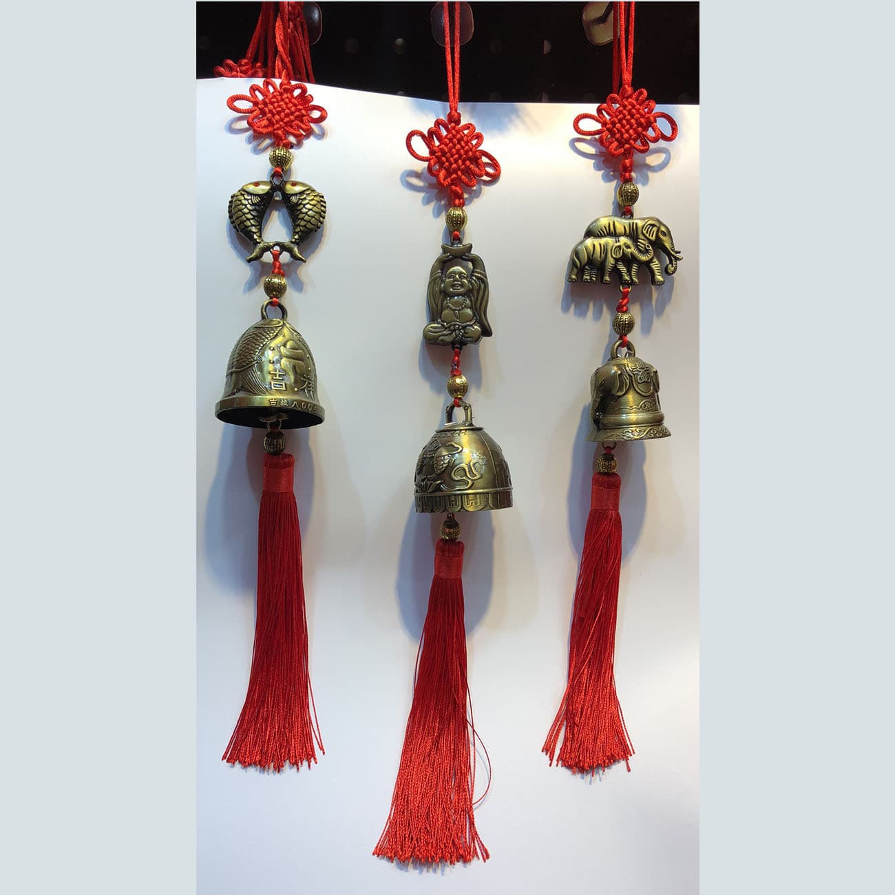 Wholesale Chinese knot, auspicious pendant with mythical creatures like Qilin, elephant, fish, dragon, phoenix, Guanyin, and Buddha bells.