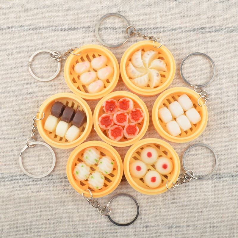 Street stall hot-selling creative simulated food keychain pendant mini steamer buns shaomai flower roll school bag pendant