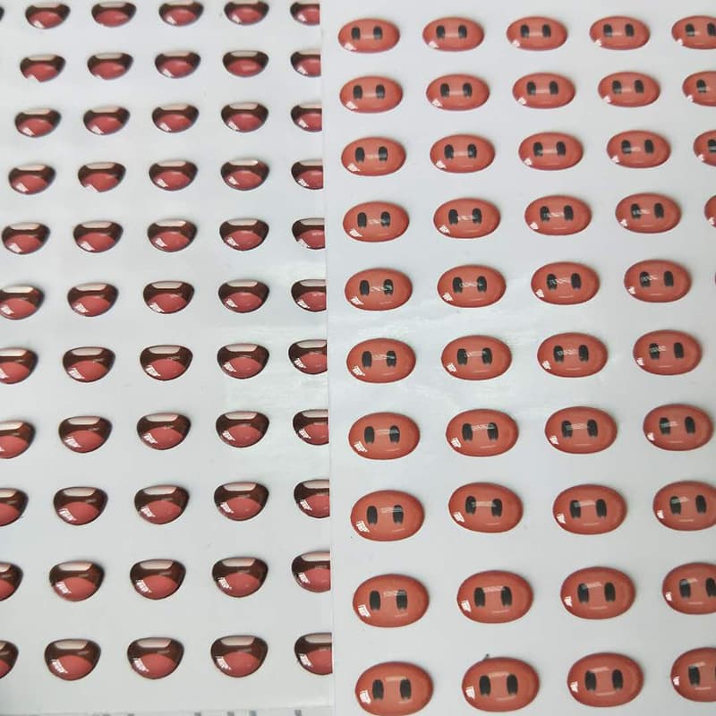 Epoxy resin manufacturers produce epoxy resin stickers for mouths, eyes, logos, car emblems, and cartoon noses.