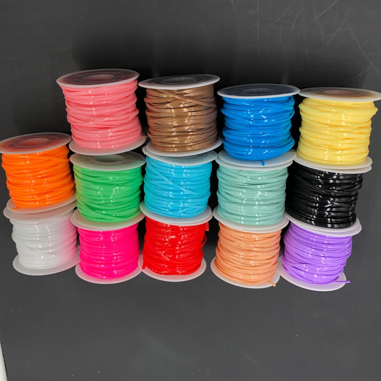 Cross-border e-commerce specializing in eco-friendly PVC plastic 14-color DIY braided rope (flat line) plastic filament handmade plastic rope