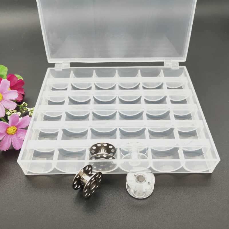 Transparent 36-compartment plastic bobbin case for home and factory use, suitable for sewing machine thread cores, and cross-stitch.