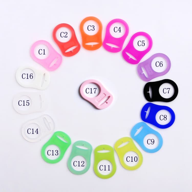 Wholesale silicone pads, pacifier pads, bottle pads, teething rings - 20 in stock, 17 colors available.