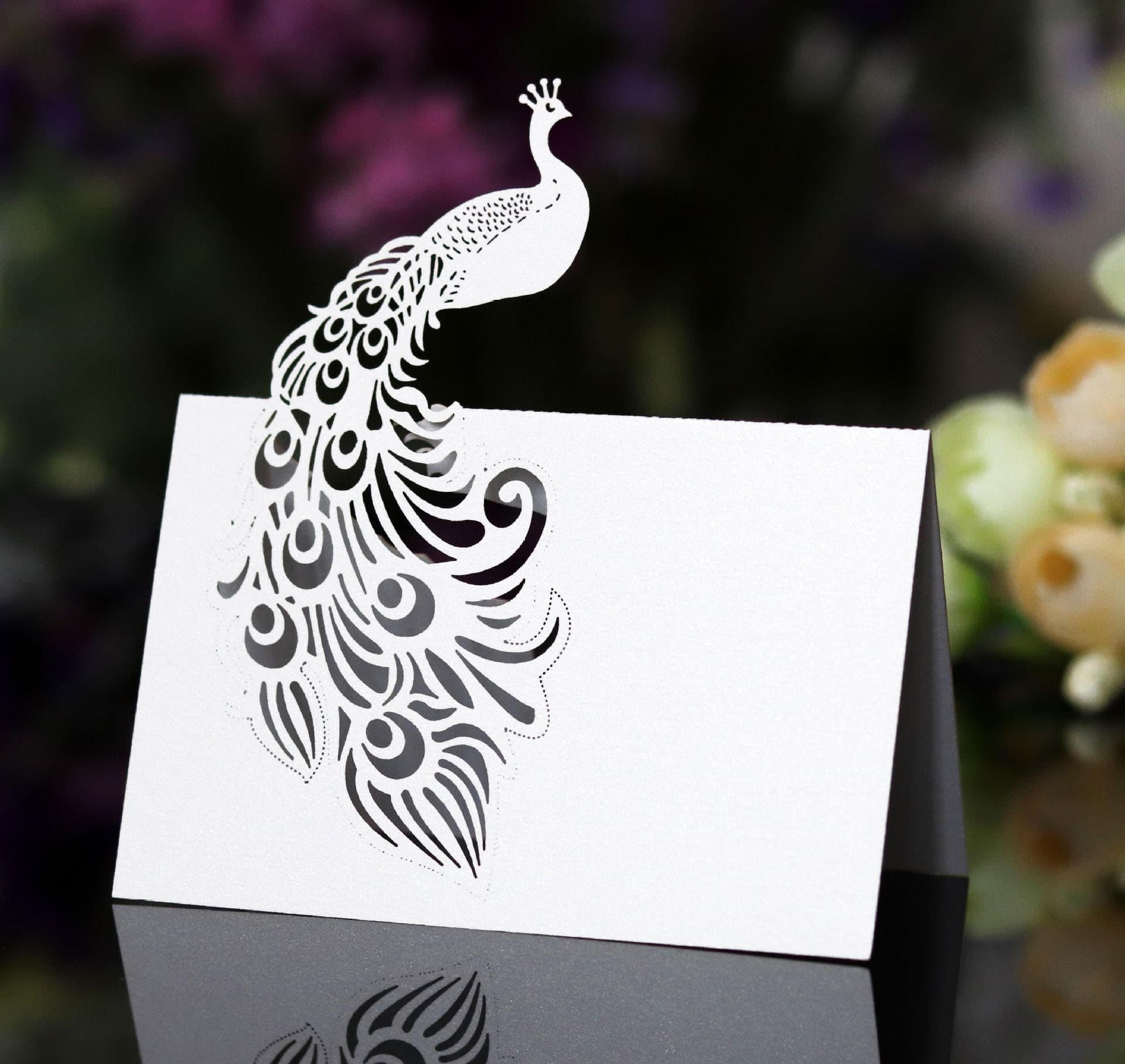 Sell Amazon laser hollow-out seat card, 3D peacock hollow-out card, check-in table wedding butterfly table card wholesale.