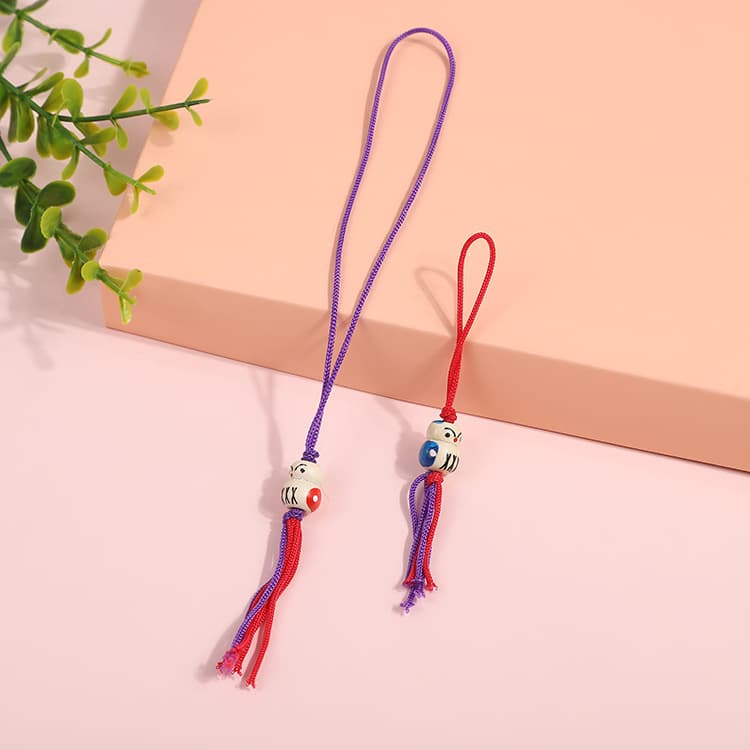 Tassel pendants, keychains, and DIY handmade wooden doll bead ornaments - Factory direct sales.