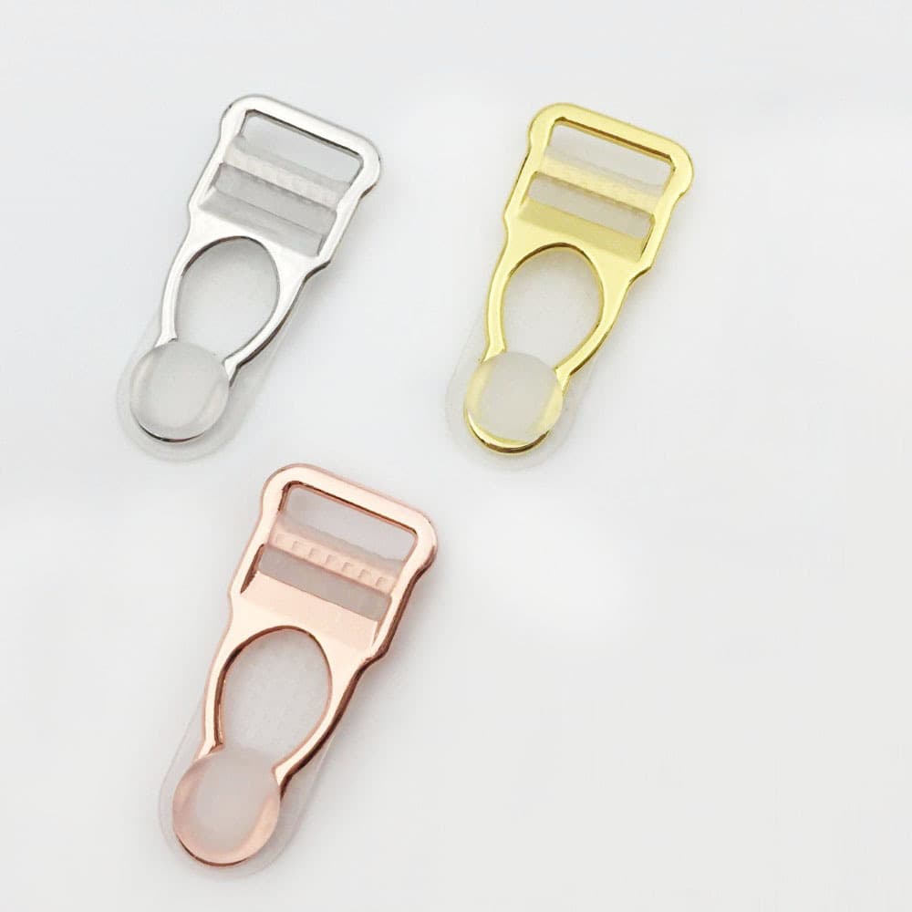 In-stock supply of lingerie accessories alloy garter clips with 12mm inner diameter for stockings.