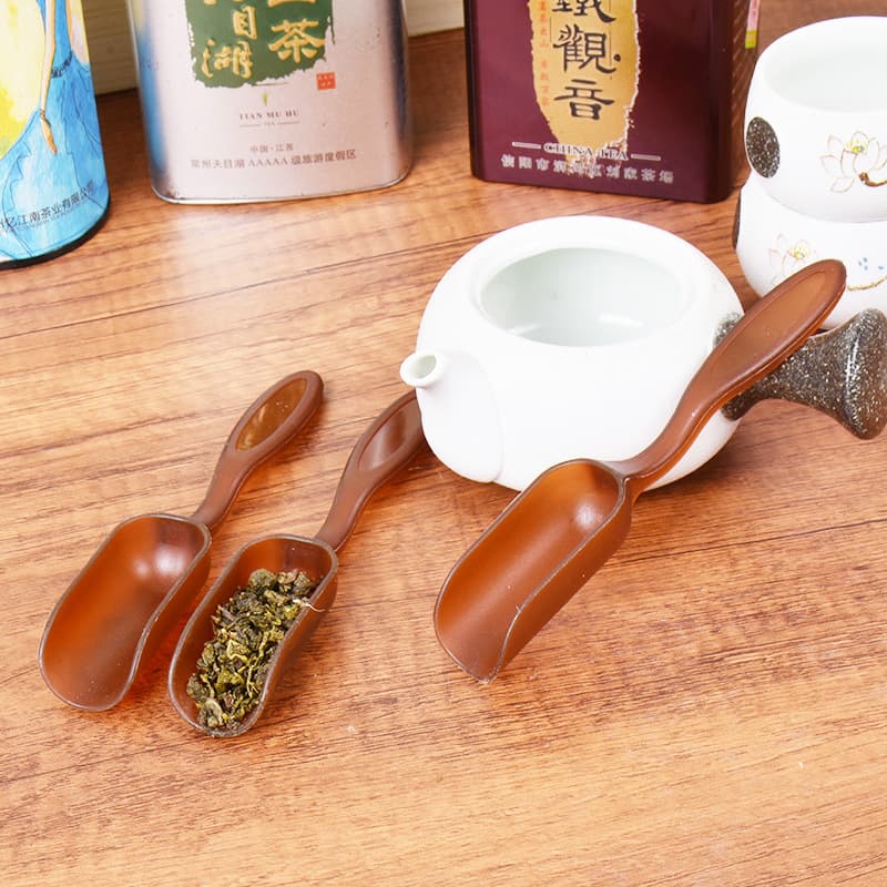 Small plastic tea spoons, tea scoops, tea spatulas, and tea ladles are essential for tea drinking.