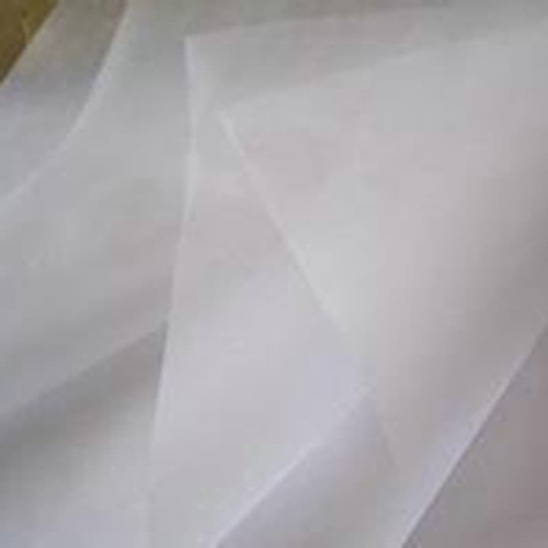 Wholesale waxed paper in stock, 22g natural white food-grade waxed paper for baking and oil-resistant packaging.