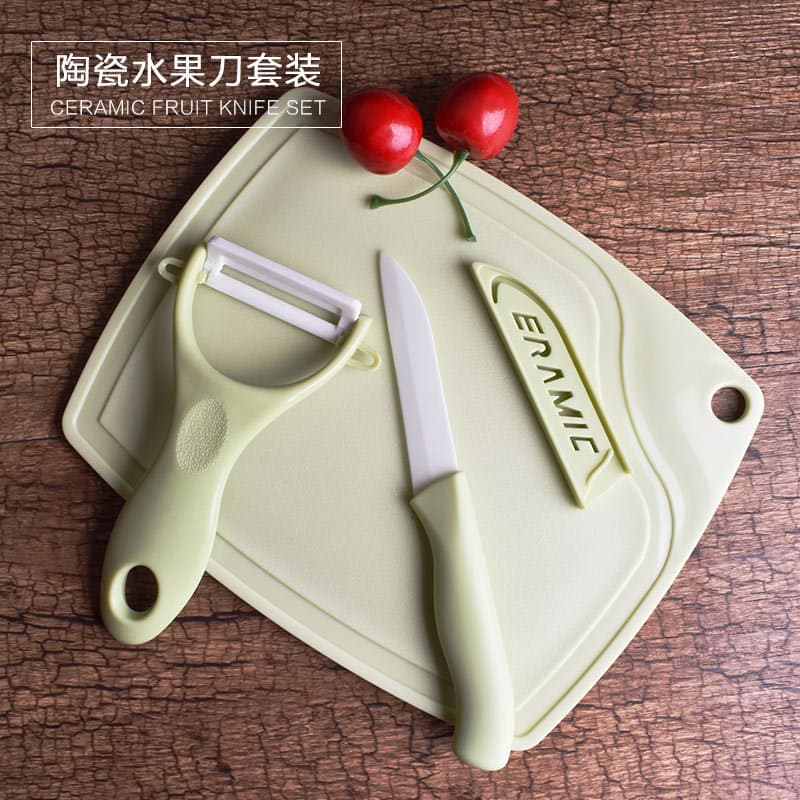 Manufacturer wholesale ceramic knife three-piece set, gift food preparation set with fruit knife, peeler, and cutting board combination.