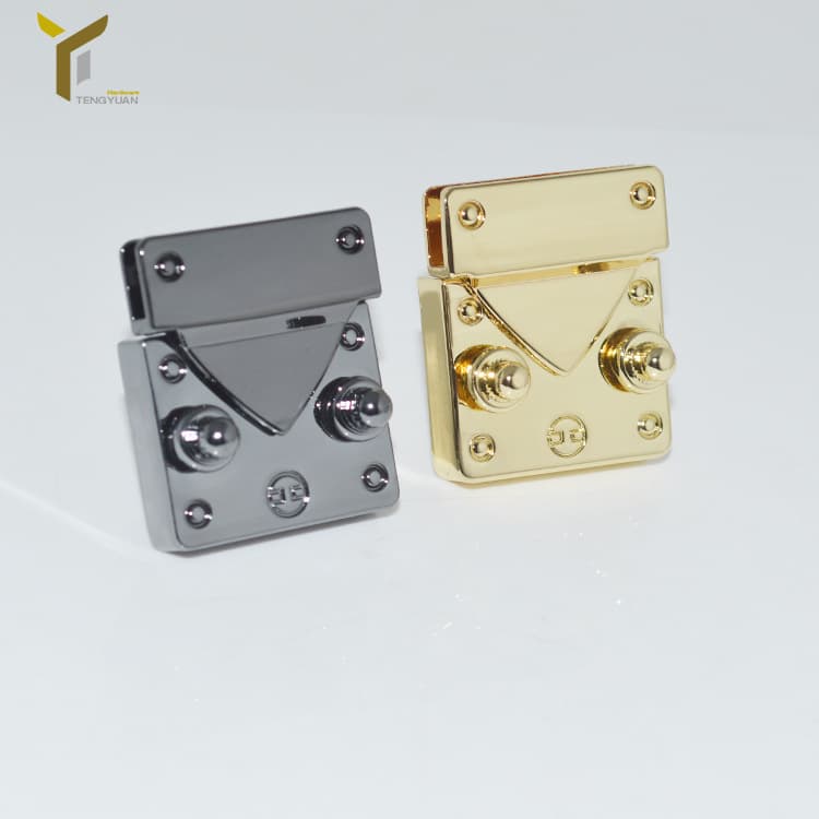 Handbag and luggage hardware mechanism locks, zinc alloy die-cast women's bag alloy button locks in light gold, available now.