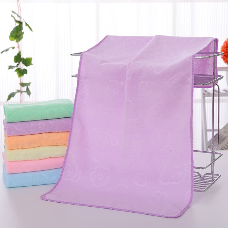 Manufacturer wholesale embossed bear 75*35 absorbent three-second quick-dry towel, fine fiber gift towel