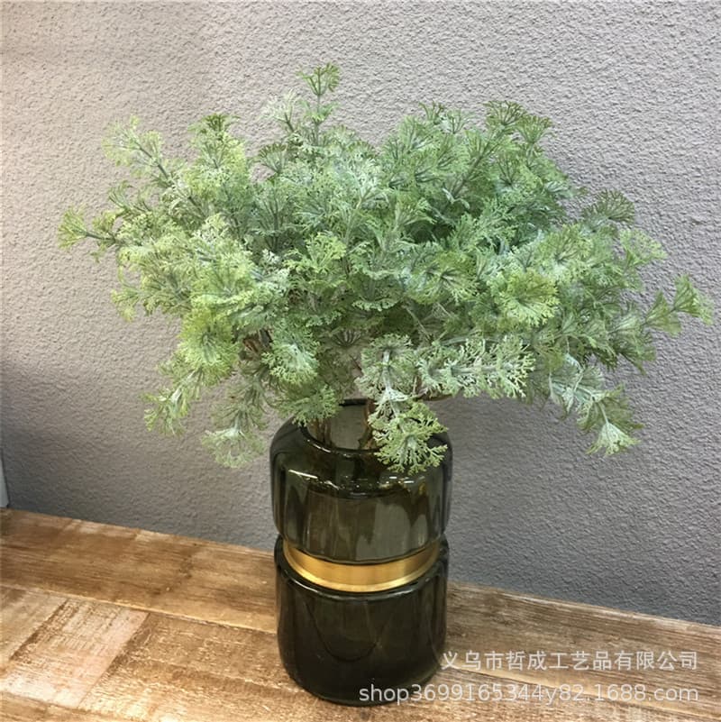 Artificial flowers, green plants, ferns, grass, wedding backdrops, floral arrangements, Persian grass, and turquoise flowers.