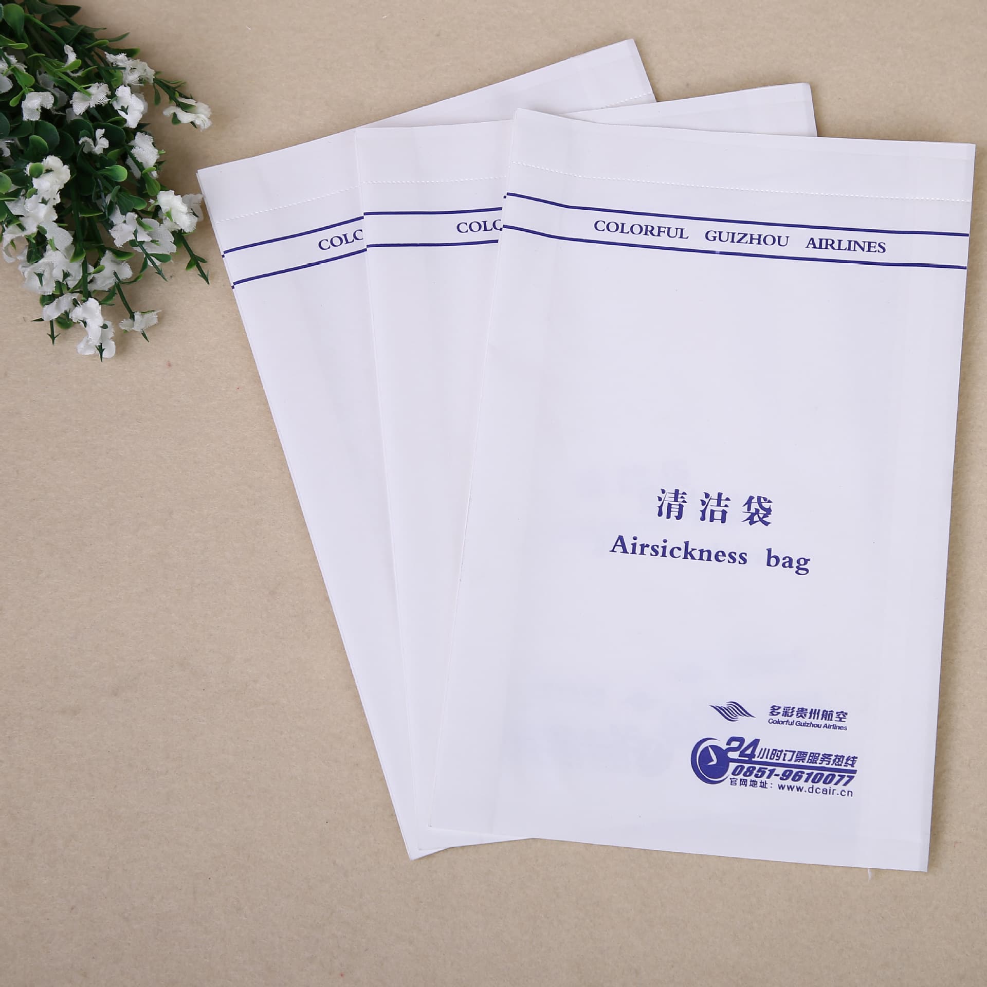 Custom disposable paper bags for airplanes, cleaning bags, train garbage bags, vomit bags, taxi customization from Wenzhou manufacturer