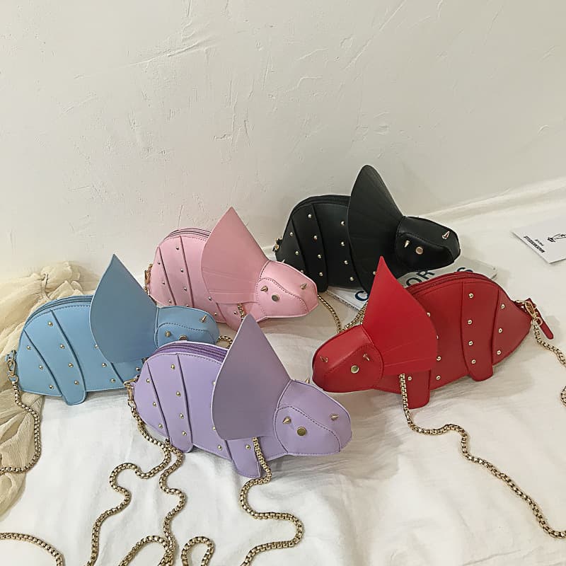 Foreign trade new style European and American fashion quirky personalized cartoon triceratops crossbody bag, creative dinosaur rivet shoulder bag for women