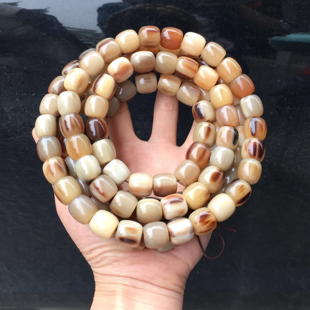 Manufacturer supplies 108 ox horn barrel beads; nationwide ox horn barrel bead catalog; wholesale ox horn barrel beads.