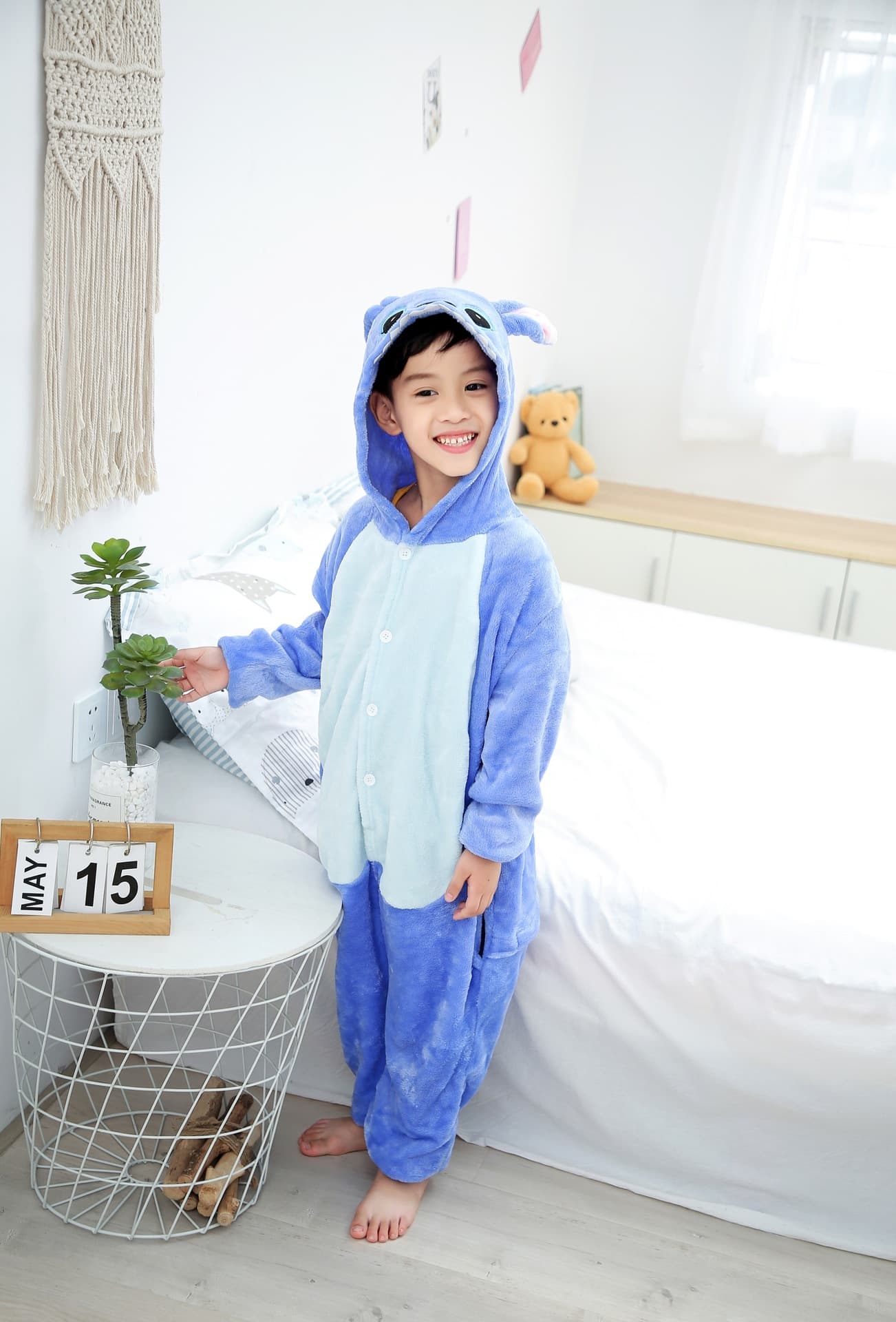 Autumn and winter cartoon one-piece pajamas children's toilet Stitch flannel performance pajamas casual home wholesale