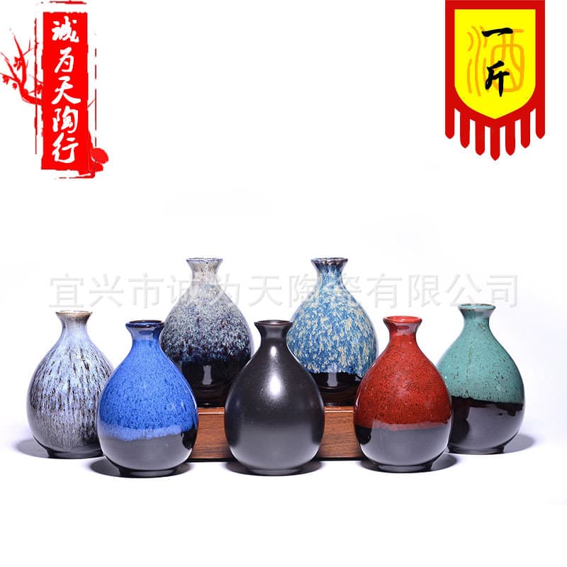 Yixing stock purple clay ceramic 1 jin bottles, complete sets for bulk liquor packaging wholesale.