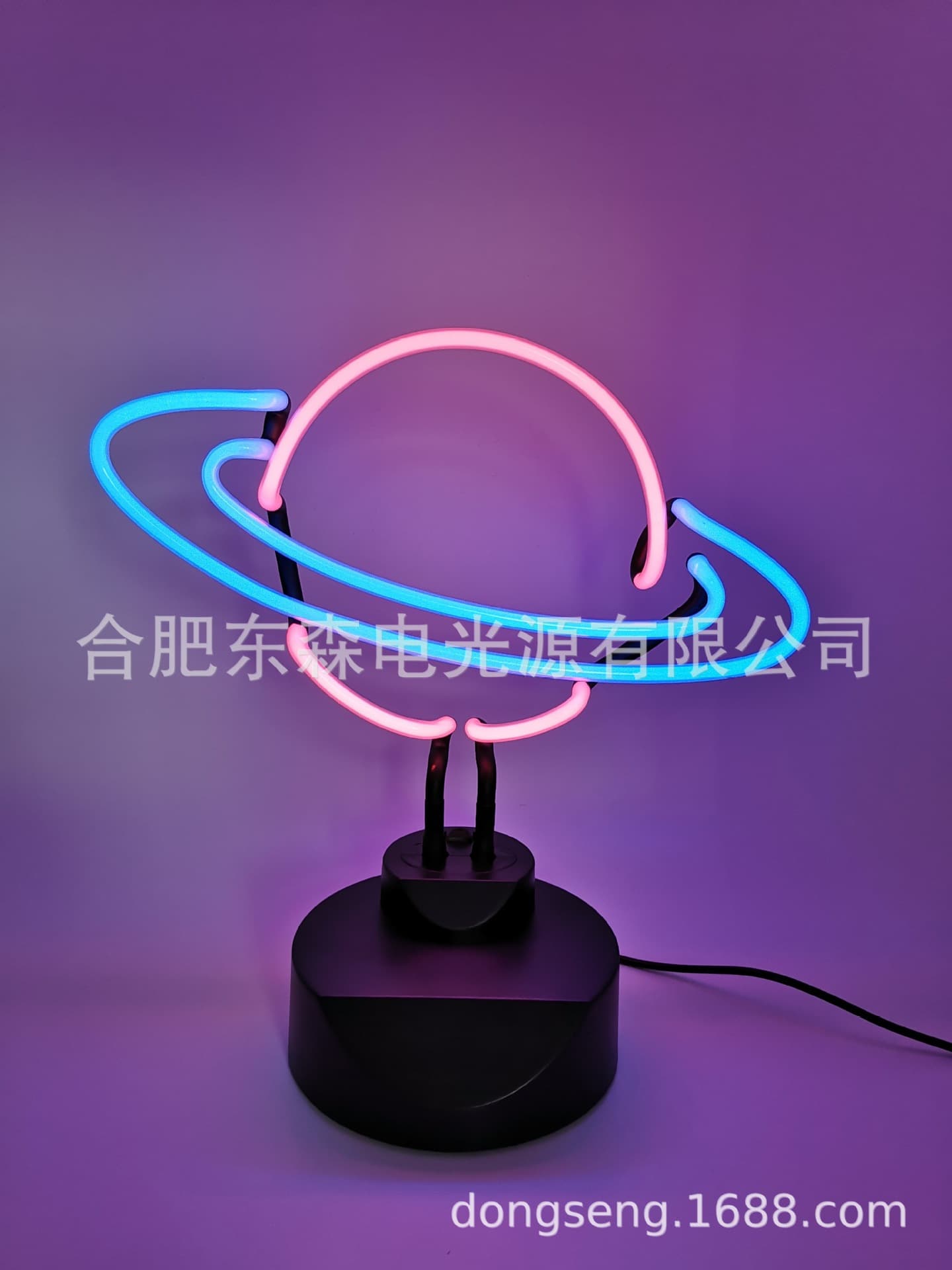 Supply of large Saturn ring neon lights.