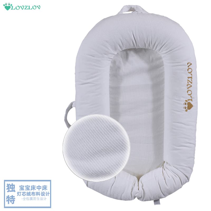 New portable corduroy baby bed, detachable and washable, bionic adjustable anti-crush, directly supplied by the manufacturer.
