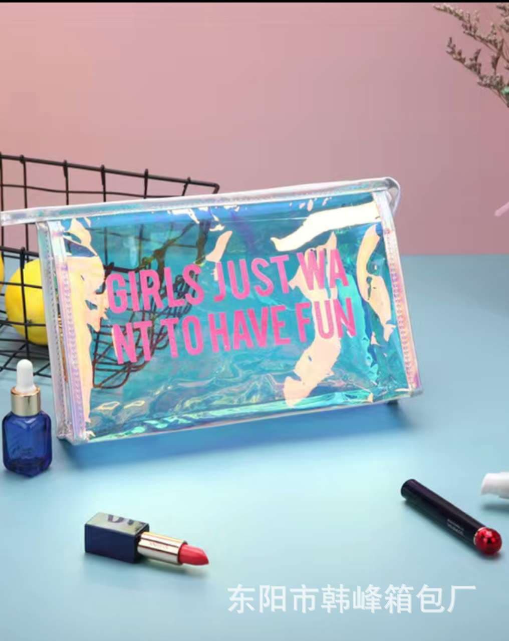Trendy PVC iridescent cosmetic bag with laser pattern, waterproof, portable travel storage, and cosmetics organization.