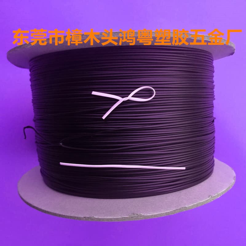 Black flat-shaped, rubber-coated iron core cable tie for automatic cable tying machines. Oval cable ties are available in various colors.