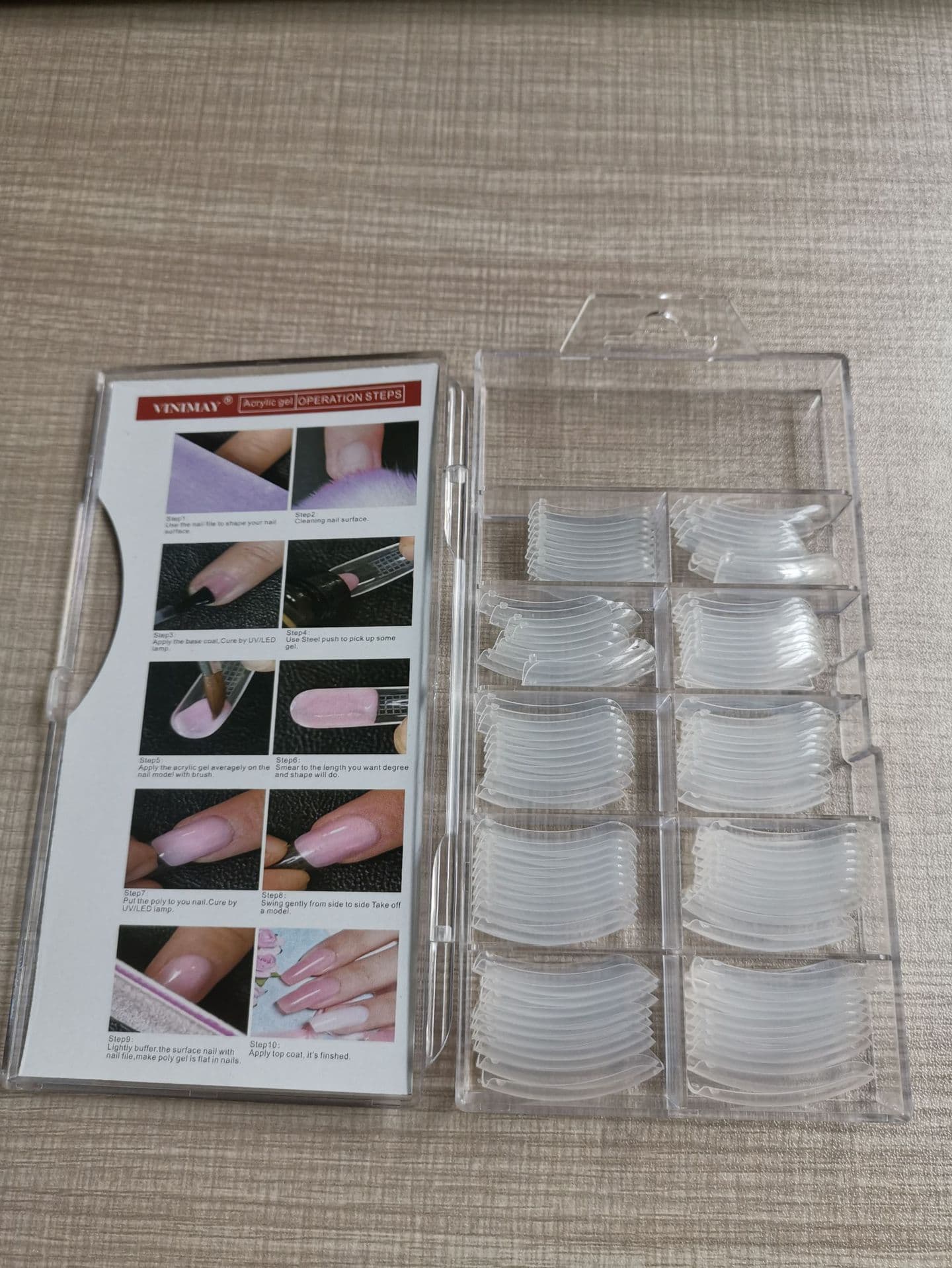 Plastic transparent nail extensions for nail salons. Multiple models of nail extensions.