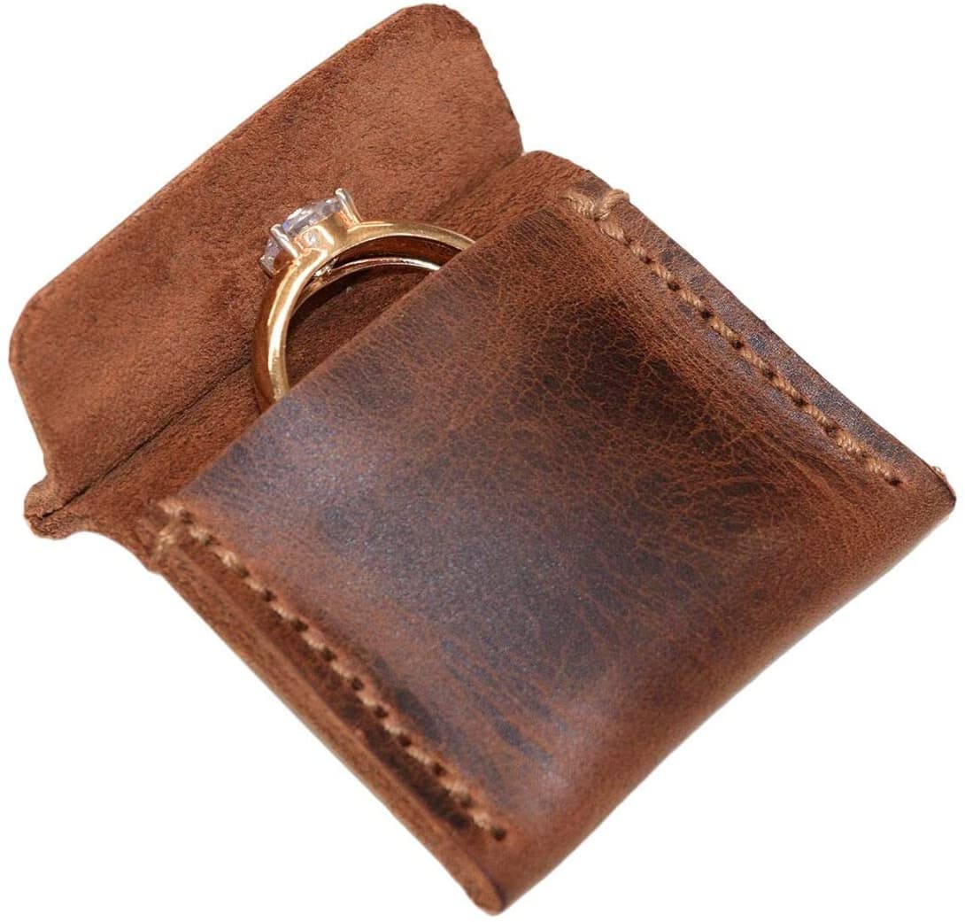 Factory custom mini ring genuine leather storage pouch, top-grain crazy horse cowhide high-end jewelry bag, logo customization available.